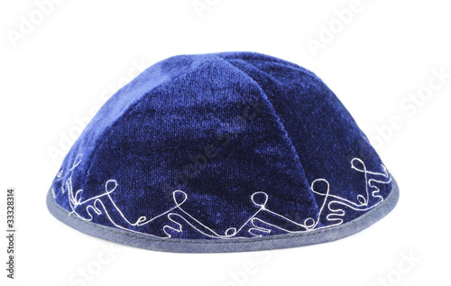 Blue yarmulke isolated on a white background.