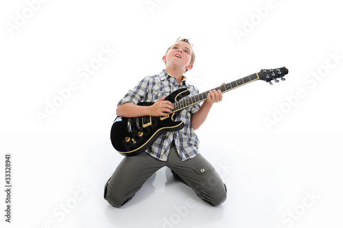Little musician playing guitar