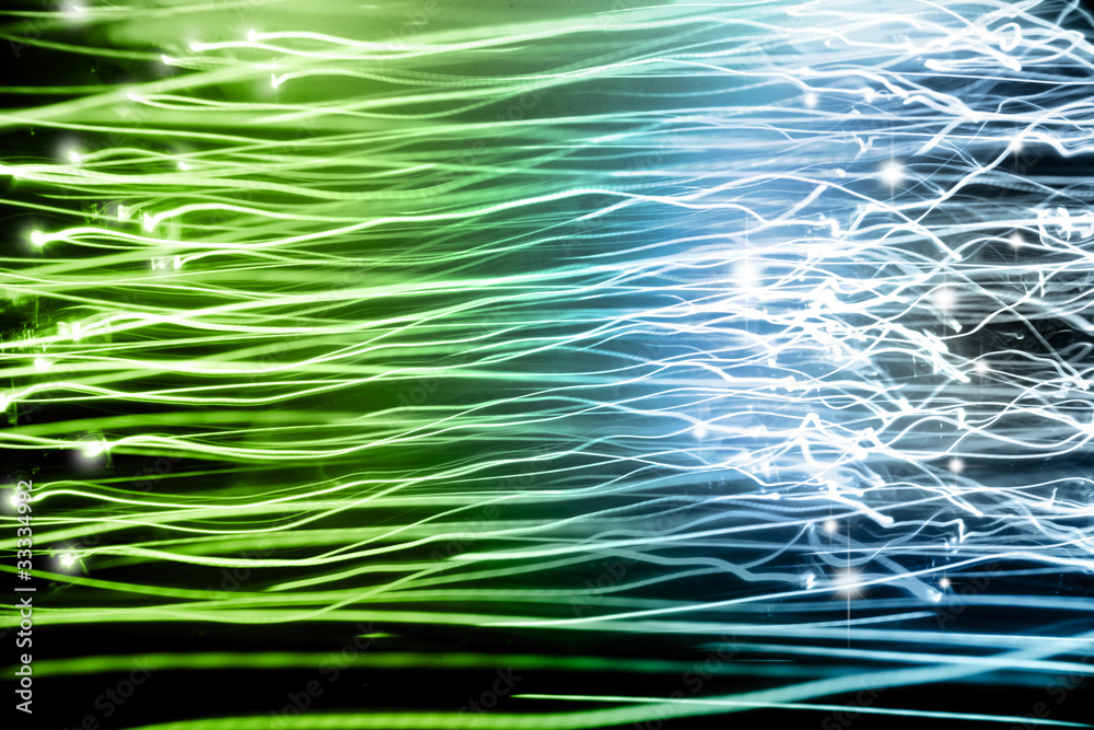 Abstract blue and green glow lines background