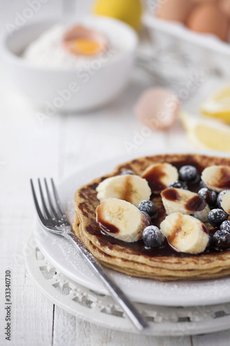 Freshly prepared crepes with banana & chocolate sauce