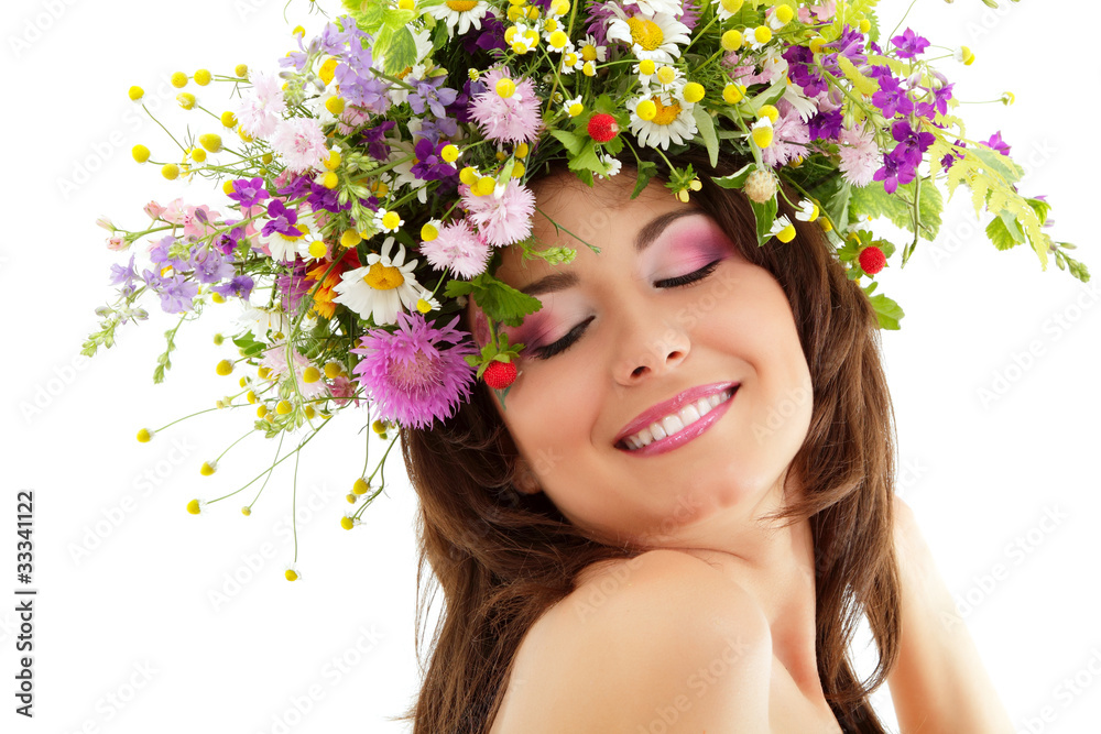 woman beauty face makeup with summer field wild flowers fresh na