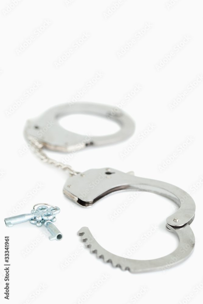 Portrait of handcuffs and keys Portrait of handcuffs and keys