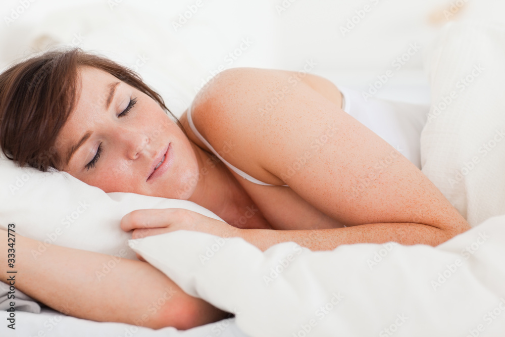 Beautiful brunette female having a rest while lying Beautiful brunette female having a rest while lying