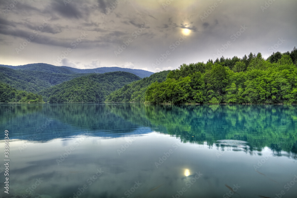 Fototapeta premium Forest lake with reflections.