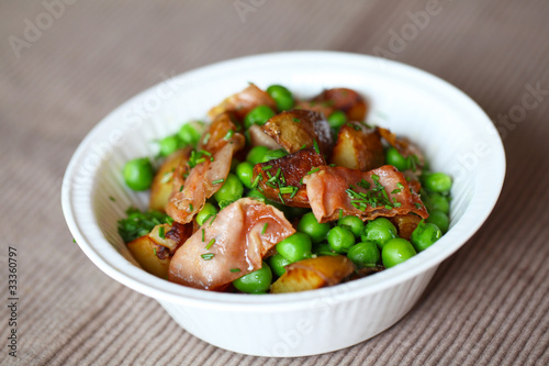 Green pea, baked potato and ham salad with dill.
