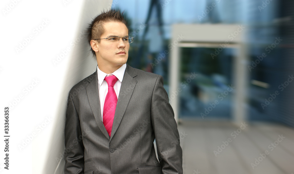 A young and handsome brunette Caucasian businessman A young and handsome brunette Caucasian businessman