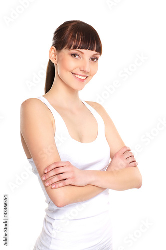 A young and fit brunette Caucasian woman in a good mood