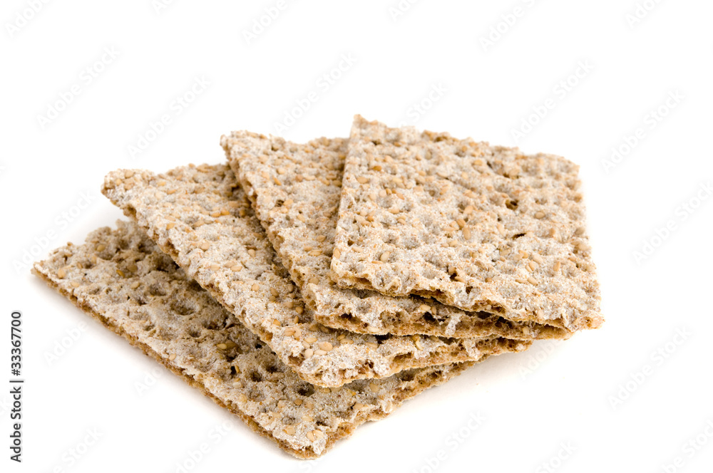 Vier Scheiben Amaranth-Sesam-Vollkornknäckebrot Vier Scheiben Amaranth-Sesam-Vollkornknäckebrot