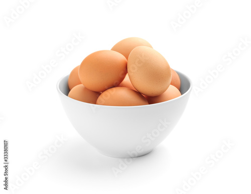 Many eggs in a porcelain bowl