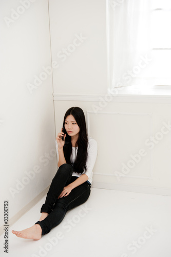 beautiful asian woman rlaxing in the room