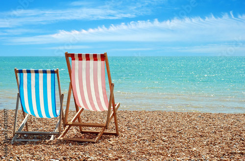 beach chairs at the ocean