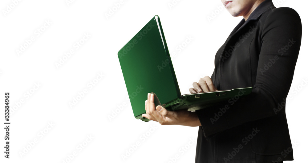 young businessman using laptop in business building young businessman using laptop in business building