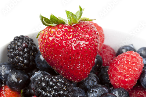 A group of fresh berries in a bowl