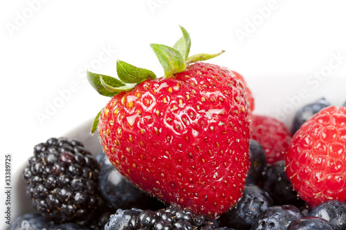 A group of fresh berries in a bowl