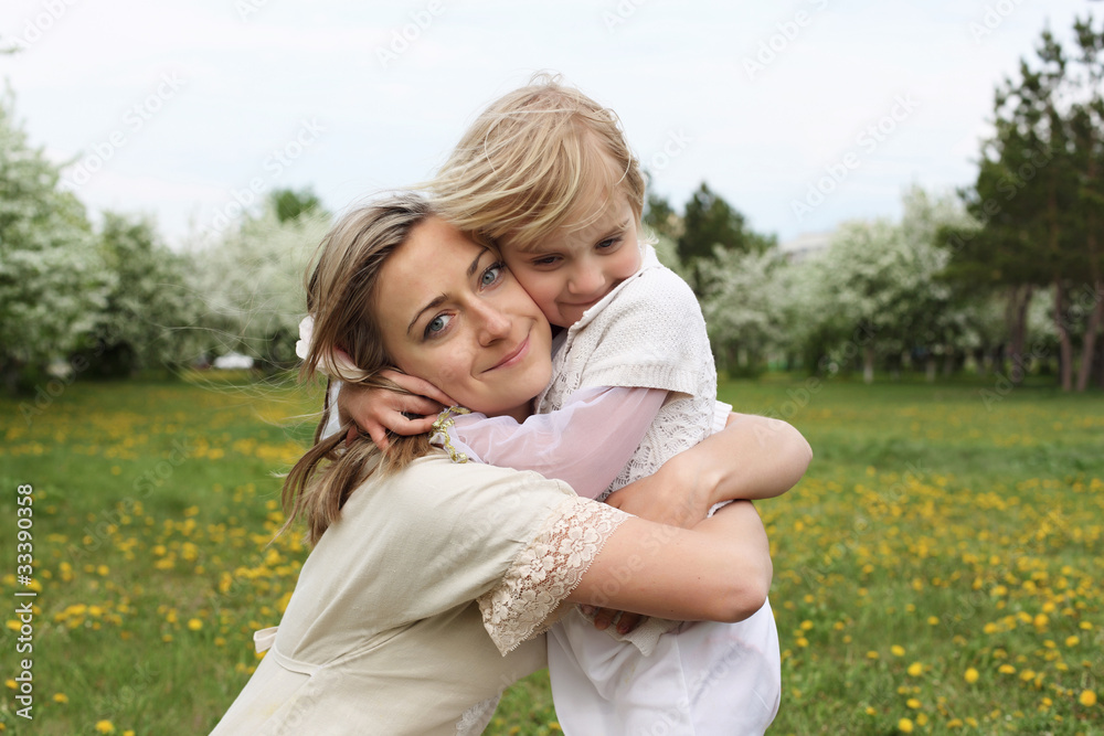 girl with mother in the park girl with mother in the park