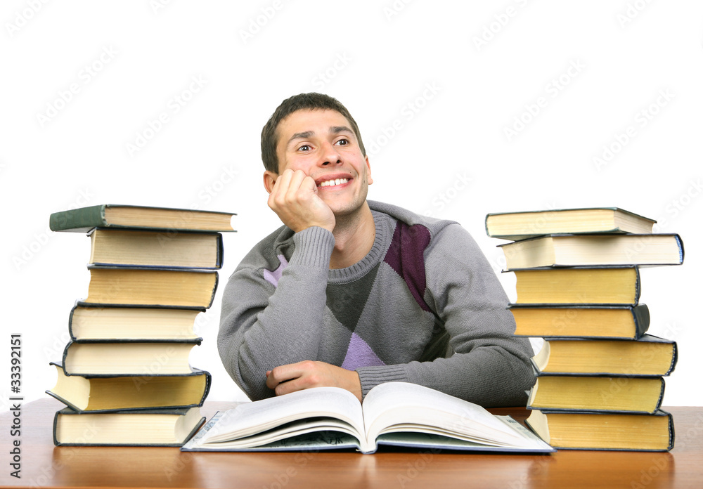 the guy is sitting among the books the guy is sitting among the books