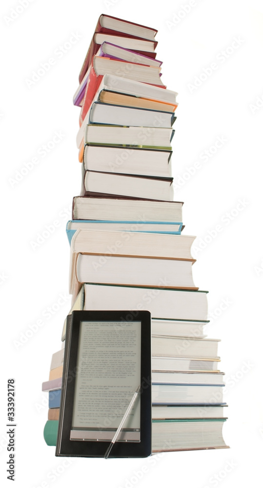 Tall stack of books and e-book reader on the white background