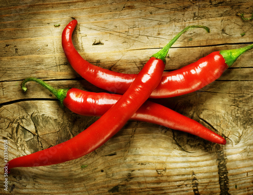 Red Hot Chili Peppers over wooden background #33394554