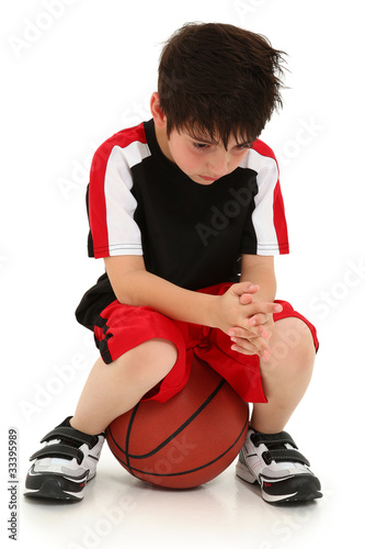 Sad Boy Lost Basketball Game photo