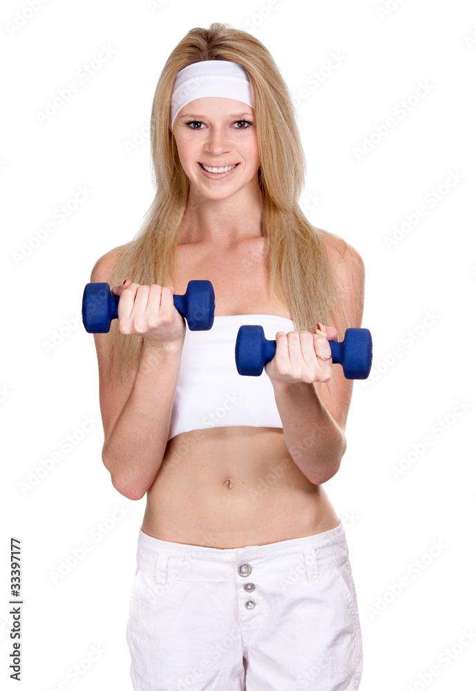Portrait of a smiling sporty woman with a dumbbell on white back Portrait of a smiling sporty woman with a dumbbell on white back