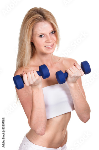 Portrait of a happy sporty woman with a dumbbell on white backgr