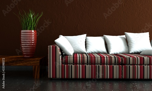 gestreiftes Sofa mit roter Vase photo