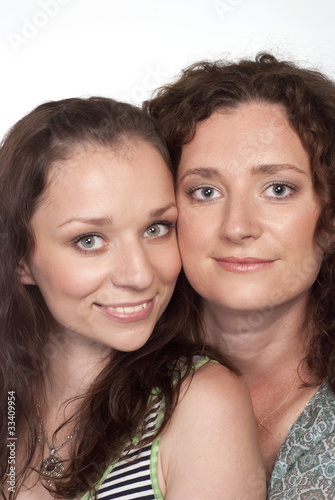 happy sisters posing