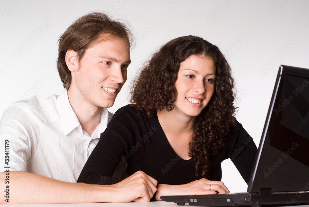young couple working young couple working