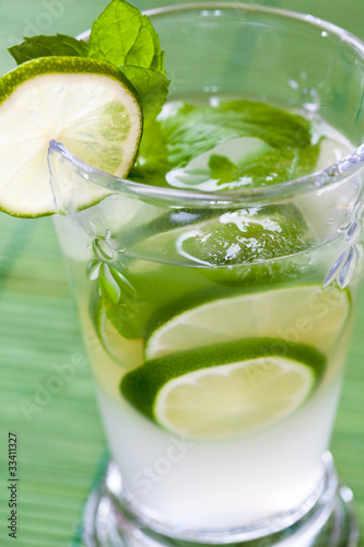 Mojito cocktail with lime and fresh mint