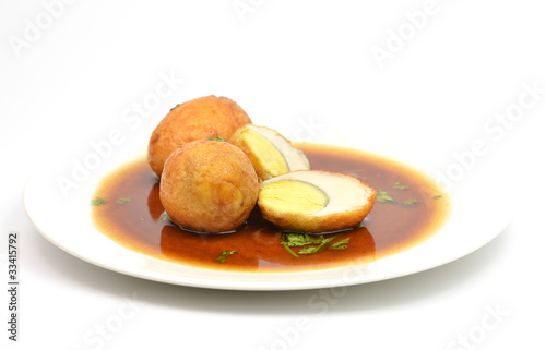 boiled egg fried with tamarind sauce