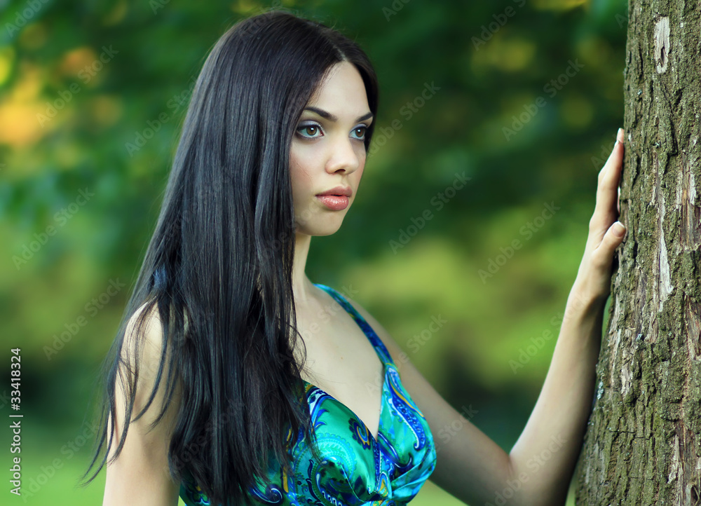 Beautiful girl over nature background Beautiful girl over nature background