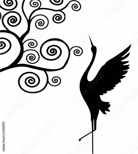 A stork spring deliver under the blooming swirl tree