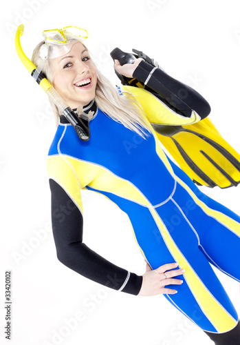 portrait of young woman wearing neoprene with snorkeling equipme photo