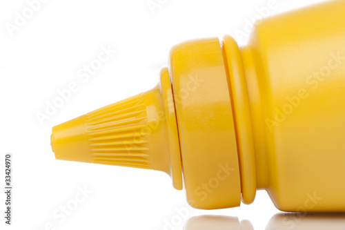A yellow mustard bottle
