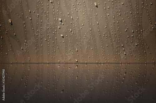 water drop on the wall with reflction