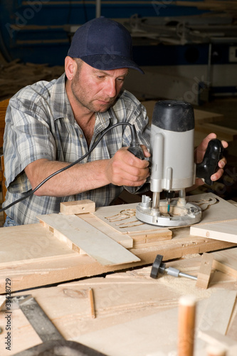 Carpenter in the woodworking shop