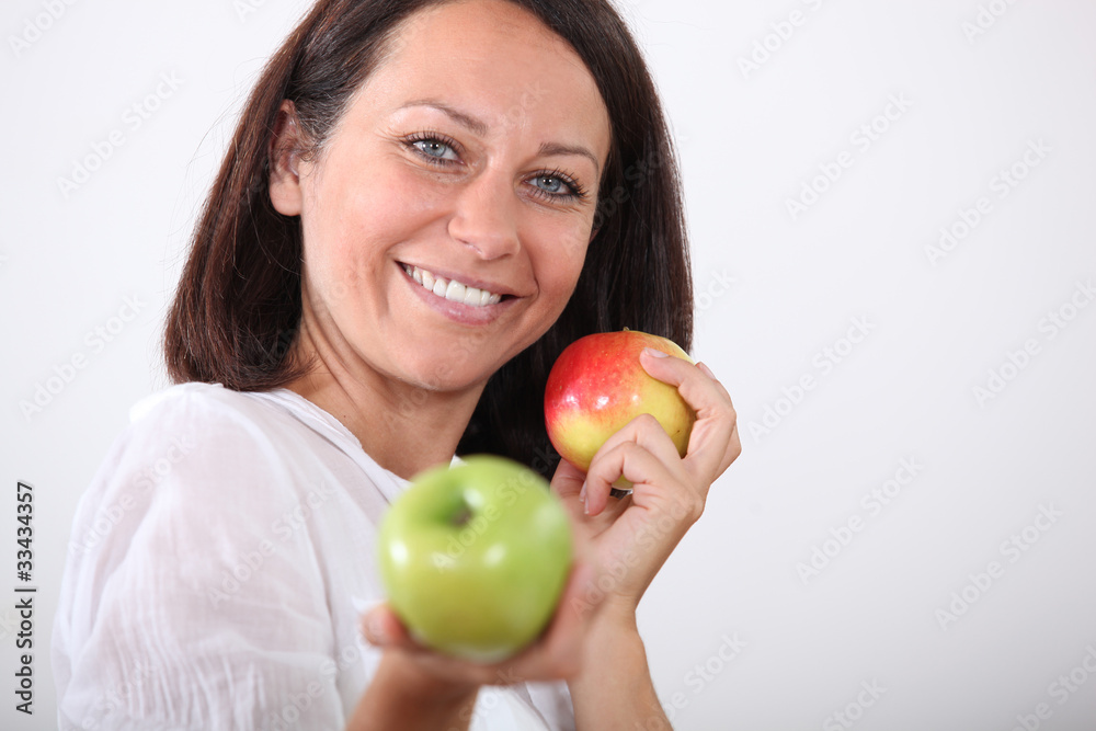 portrait of a woman with apples