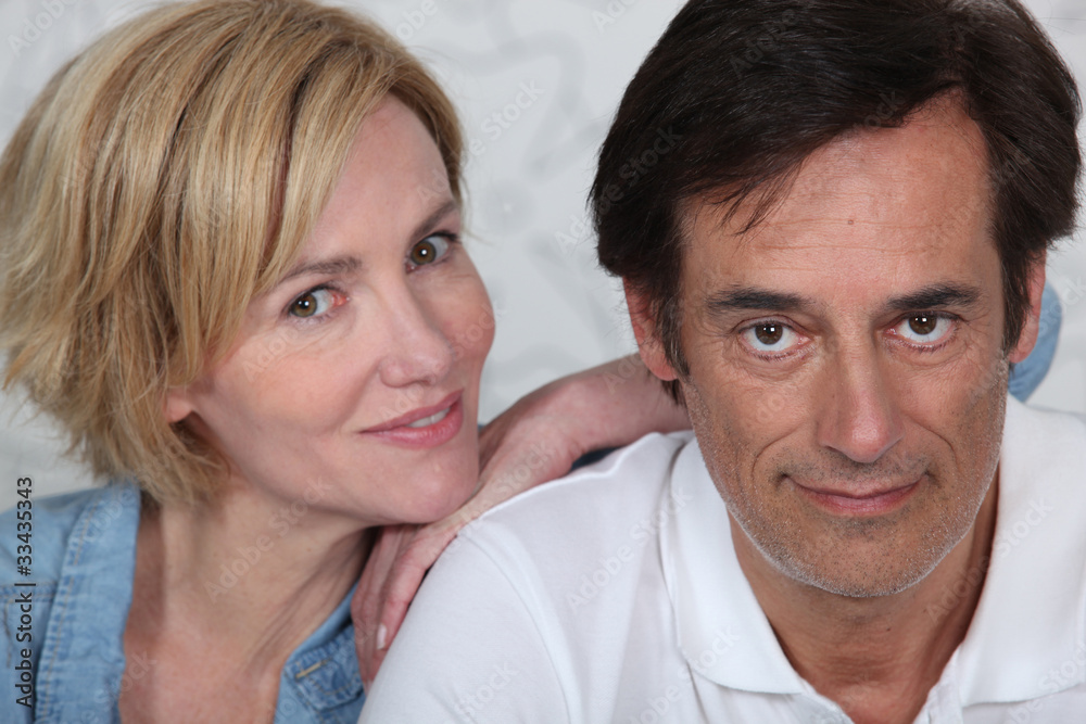 Head and shoulder shot of a mature couple Head and shoulder shot of a mature couple
