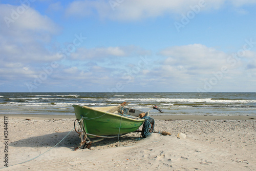 traditional fishing boats hauled at shore on the beach