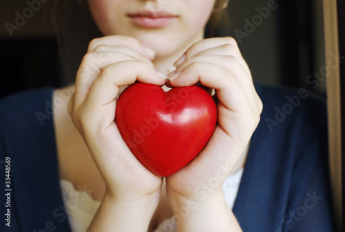Fototapeta Naklejka Na Ścianę i Meble -  woman hands holding heart