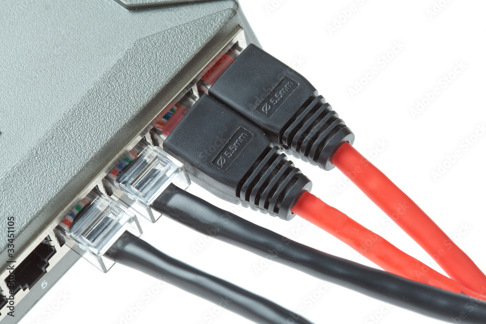 Computer LAN Cables with Router on White Background Computer LAN Cables with Router on White Background