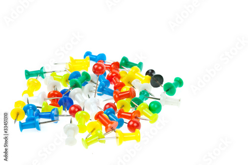 isolated colorful pushpins focus at red
