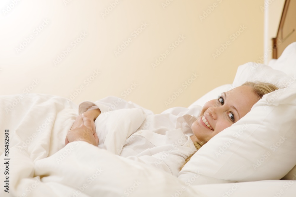 Peaceful Woman Lying in Bed Resting at Home Peaceful Woman Lying in Bed Resting at Home