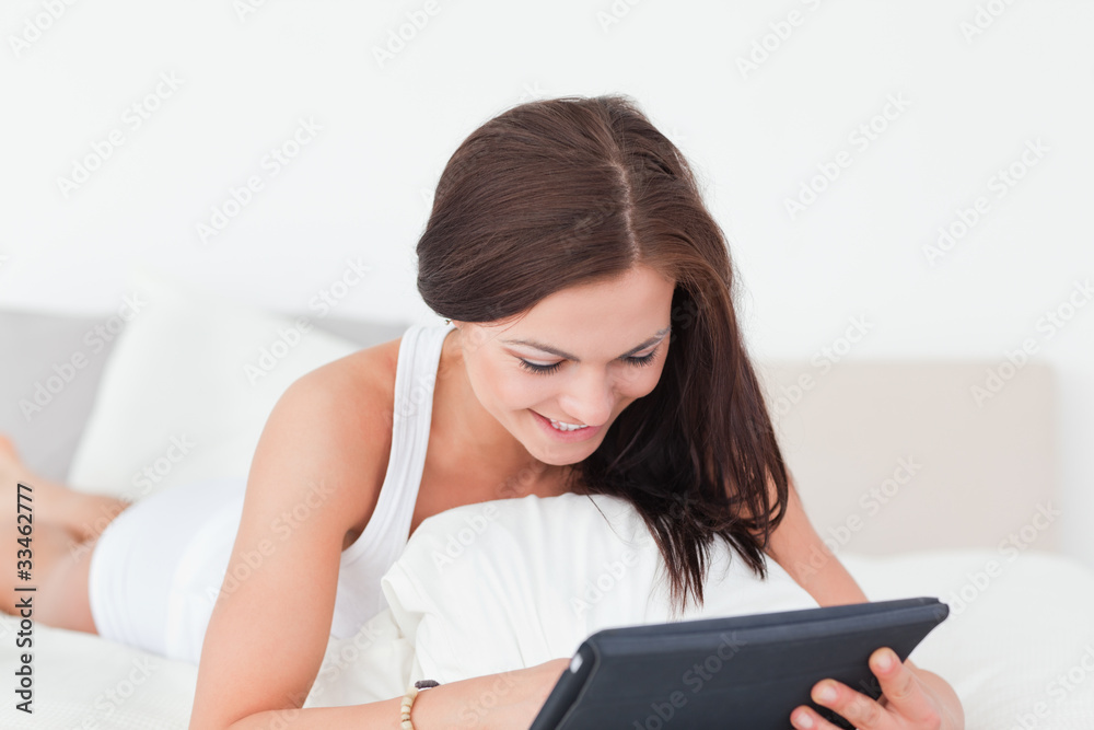 Smiling young woman with a tablet Smiling young woman with a tablet