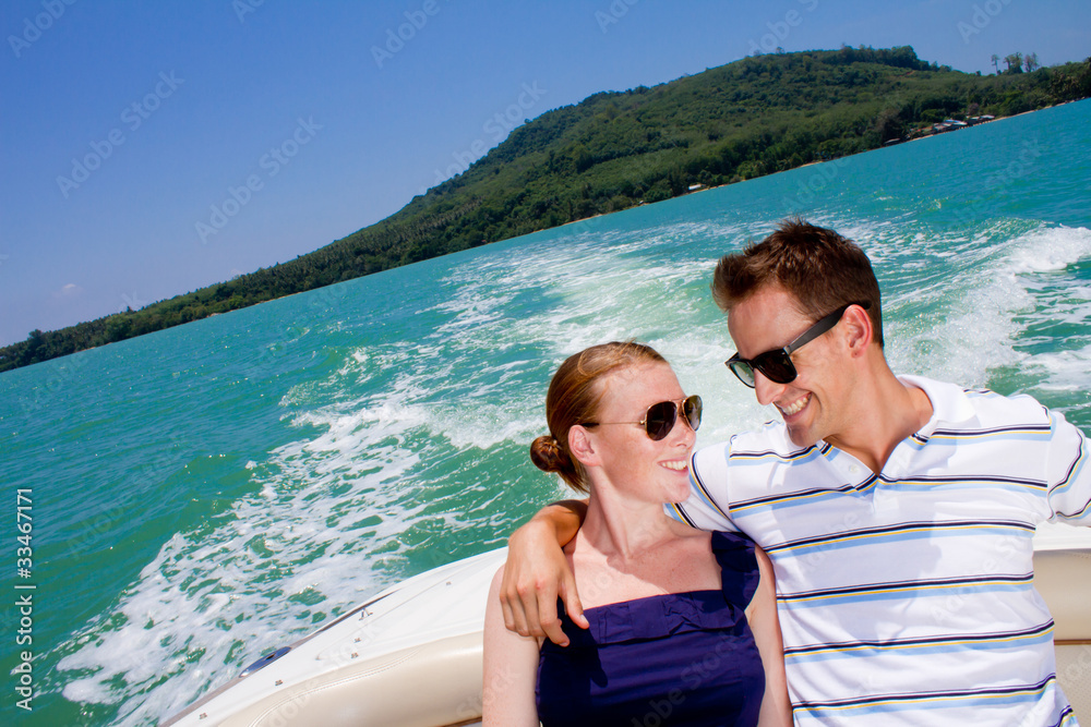 Couple Relaxing On A Boat
