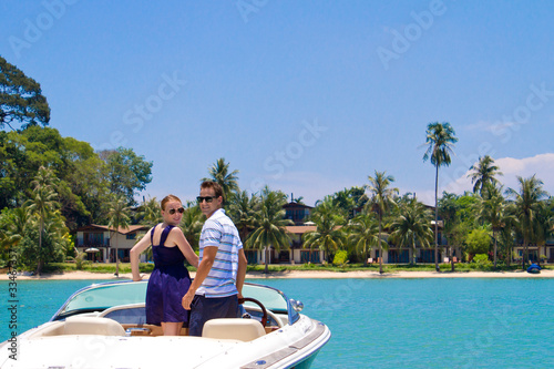 Couple Relaxing On A Boat