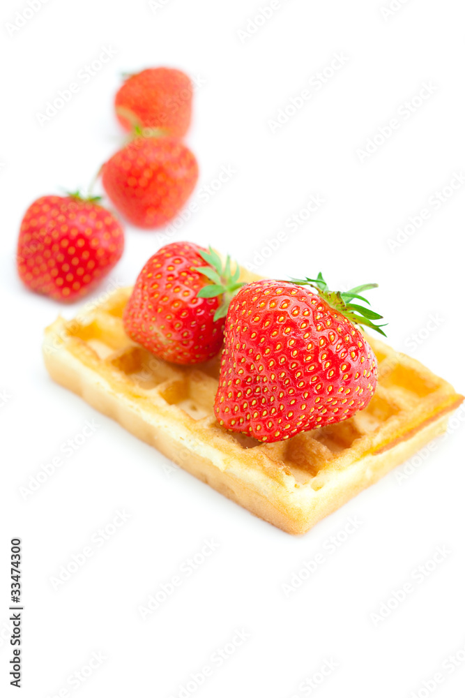 Waffles and strawberries isolated on white Waffles and strawberries isolated on white