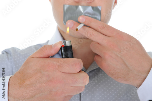 Businessman holding a cigarette