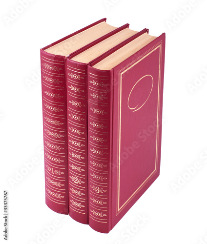 Photography Vertical stack of three red books isolated over white