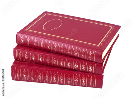 Obraz na plátně Horizontal pile of three red books
